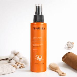 Aurodhea sun spray bottle, SPF 50, water resistant lotion with aloe vera and vitamins, ideal for sun protection.
